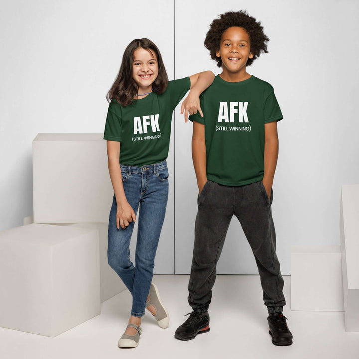 Two kids modeling the AFK Youth t-shirt in green, showcasing its moisture-wicking and modern fit.