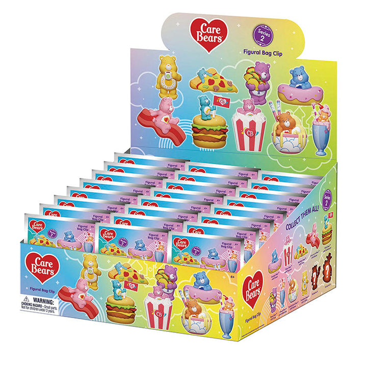 Care Bears Series 2 3D Collectable Keychains displayed in a colorful box featuring various characters and collectibles.