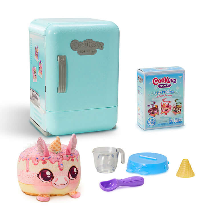Cookeez Makery S2 Freezy Cakez Playset with mini fridge, plush treat, and accessories for creative fun.