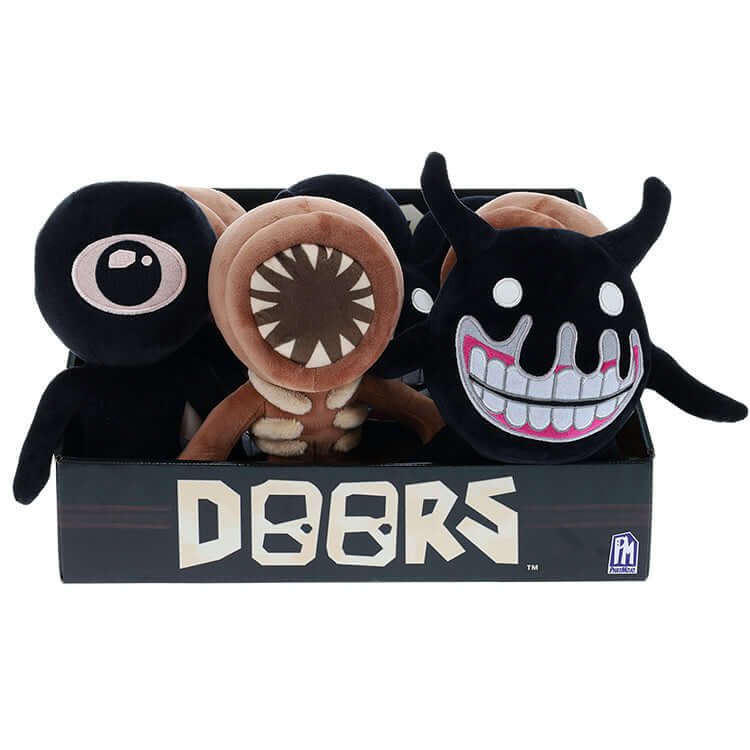 Doors Collectable Plush toys displayed in a box, featuring Screech, Figure, and Seek from the hit game.