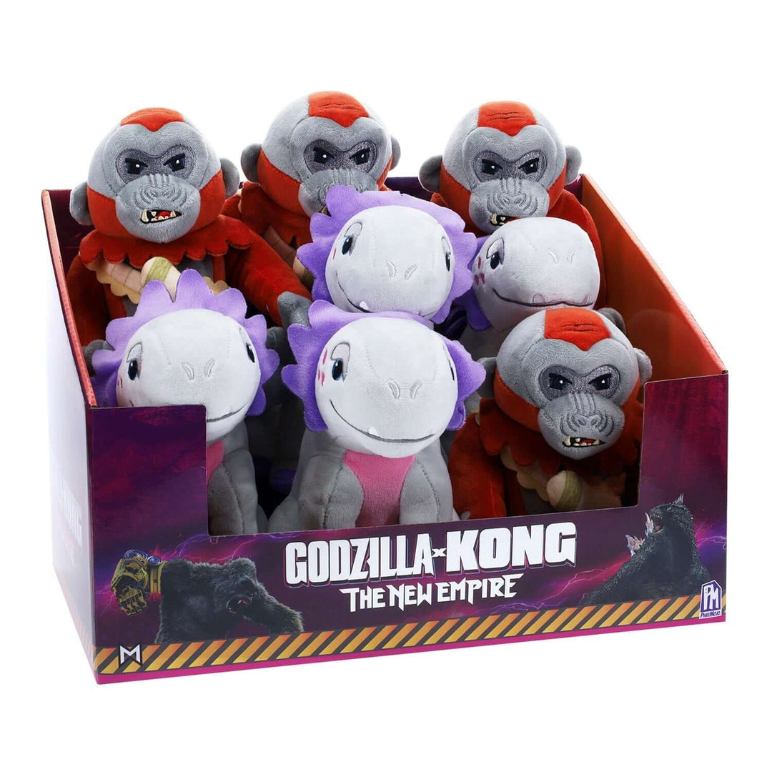 Display of Godzilla x Kong The New Empire 6" Creature Collectable Plush, featuring colorful plush monsters in a box.