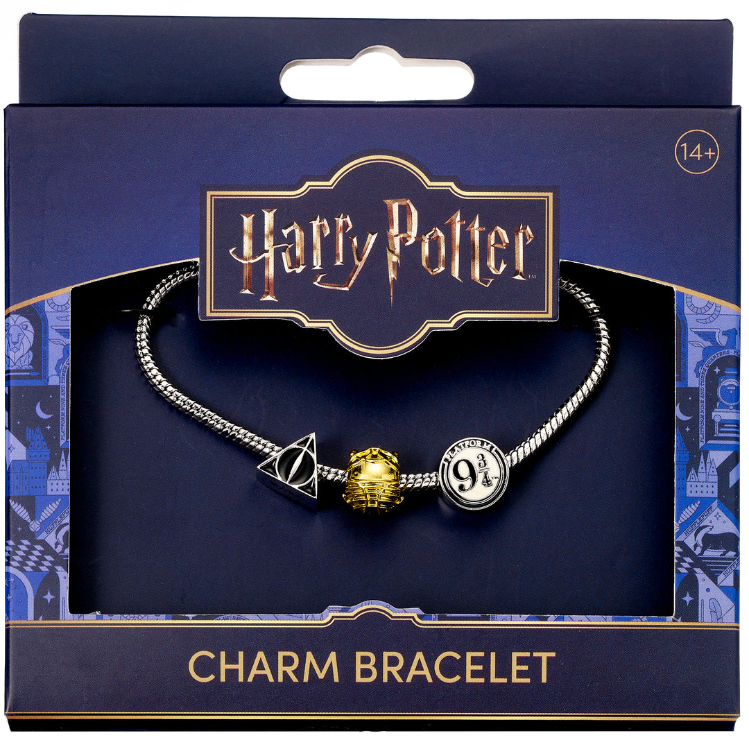 Harry Potter charm bracelet featuring Deathly Hallows, Golden Snitch, and Platform 9 3/4 charms in packaging.