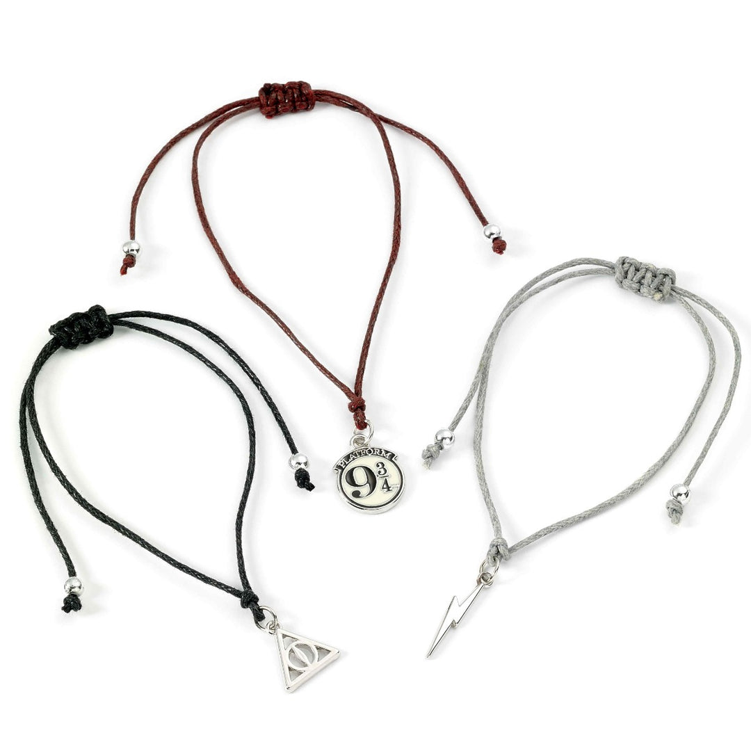Harry Potter friendship bracelet set featuring Platform 9 3/4, Lightning Bolt, and Deathly Hallows charms on nylon cords.