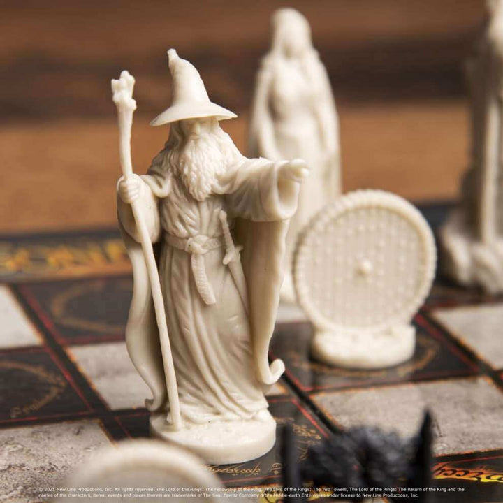 alt_tag: The Lord of the Rings - Battle For Middle Earth Chess Set with Gandalf the Grey piece on the chessboard.