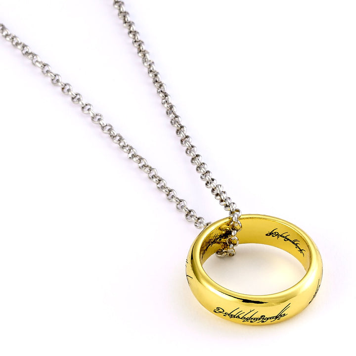 The Lord of the Rings necklace featuring the One Ring on a silver chain, detailed engravings visible.