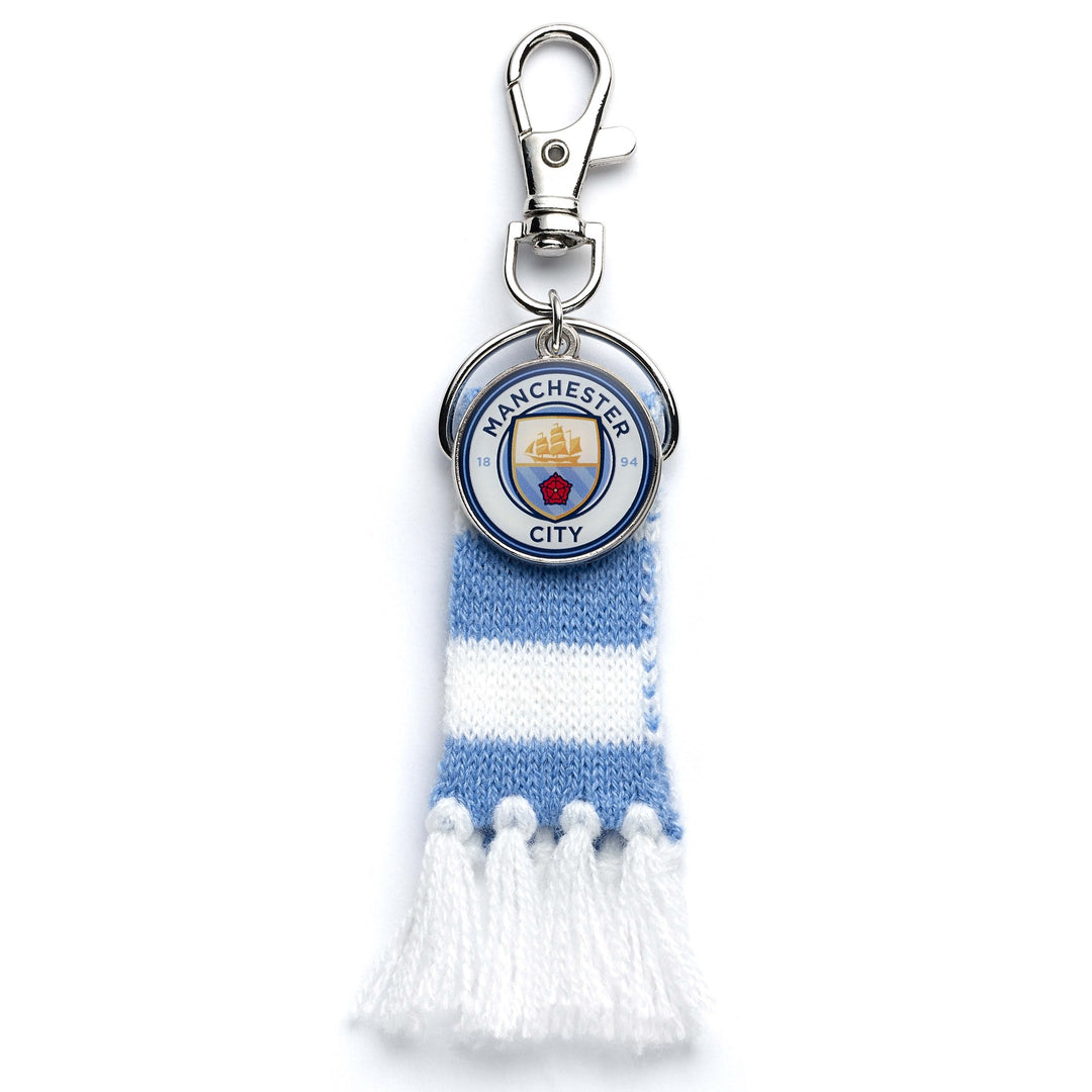 Manchester City backpack hanger with logo charm and blue scarf design.