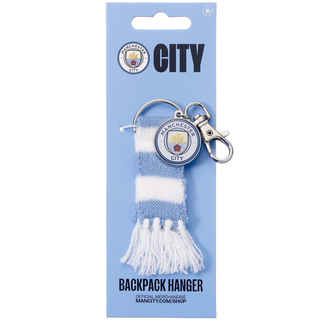 Manchester City backpack hanger featuring club emblem and striped scarf design.