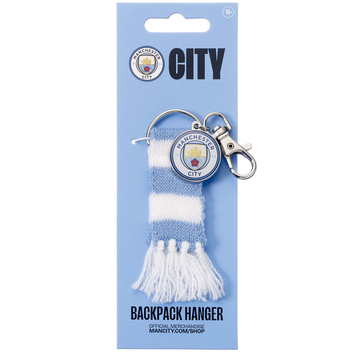 Manchester City backpack hanger featuring club emblem and striped scarf design.
