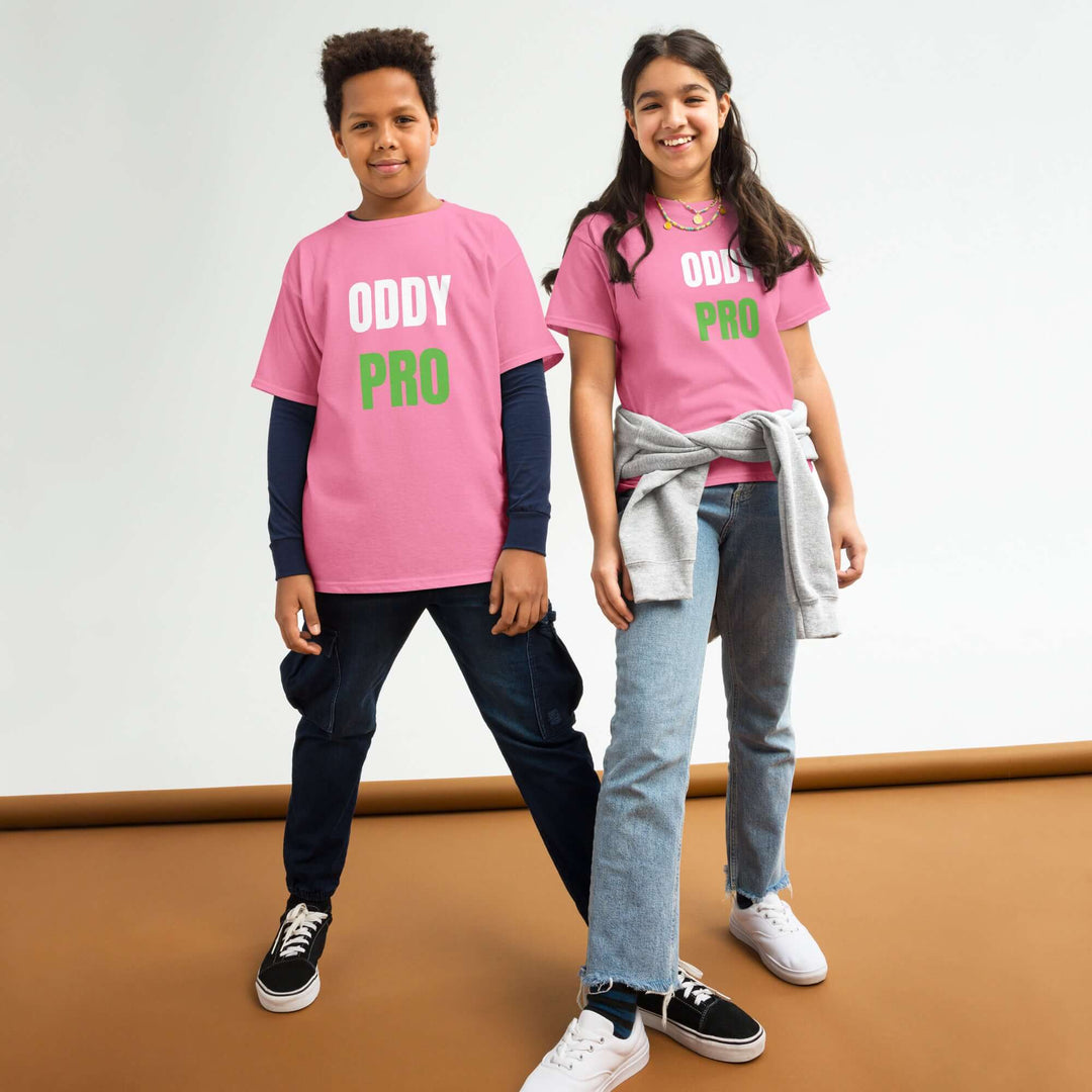 Two children wearing the Oddy Pro Youth classic t-shirt in pink, showcasing its stylish design and comfortable fit.