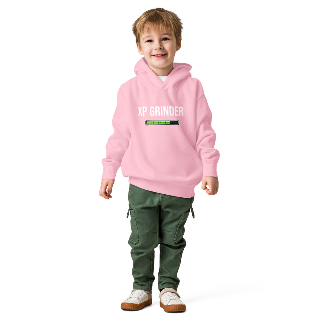 XP Grinder Toddler fleece pullover hoodie modeled by a smiling child in a pink hoodie and green pants.