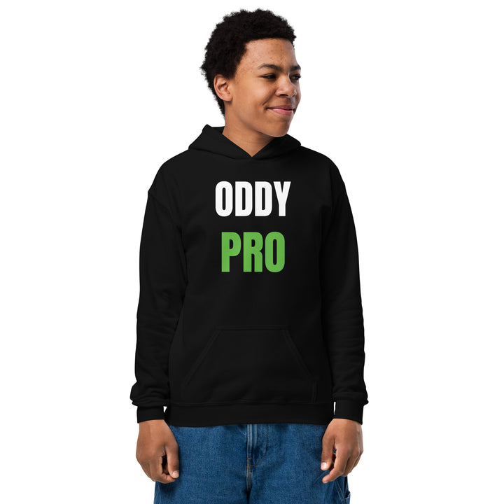 Oddy Pro Youth heavy blend hoodie displayed on a child, showcasing its comfortable design and stylish branding.