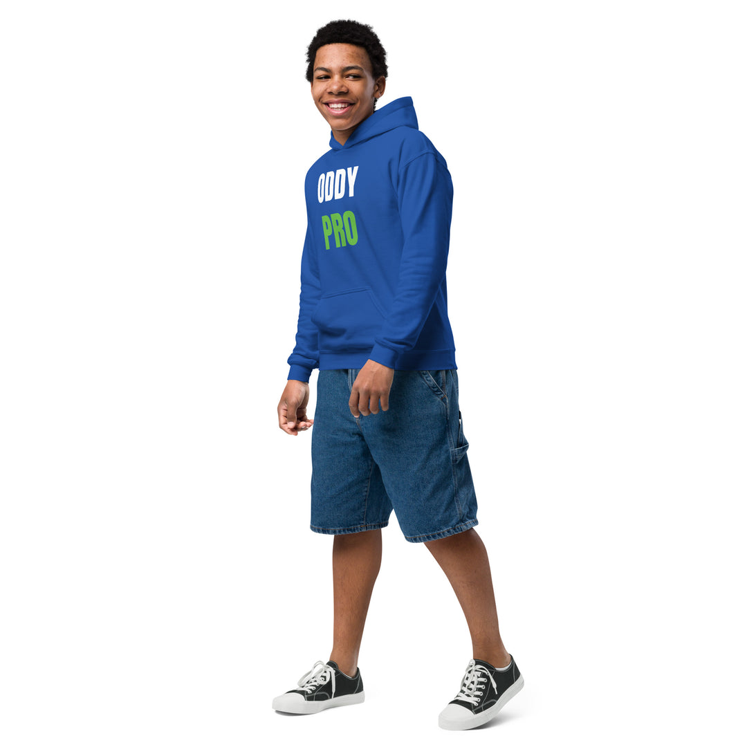 Oddy Pro Youth heavy blend hoodie worn by a young boy, showcasing its vibrant blue color and stylish design.