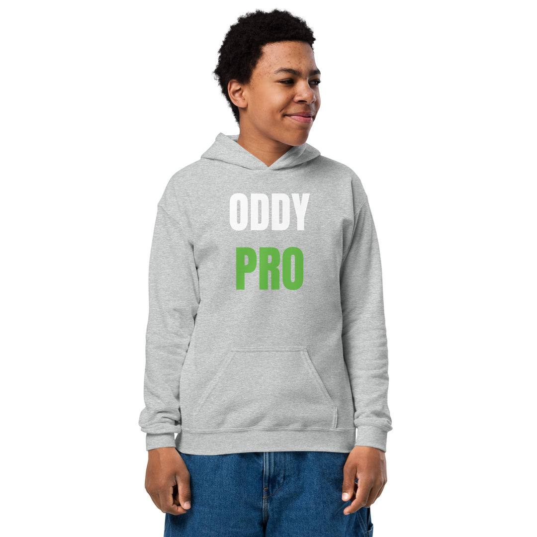 Boy wearing Oddy Pro Youth heavy blend hoodie in grey, featuring large letters, perfect for active children.